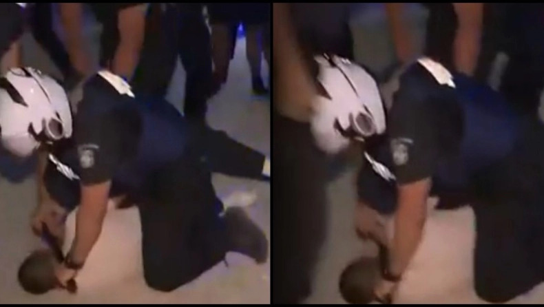 Σοκαριστική εικόνα: Αστυνομικός πίεζε με γκλοπ τον λαιμό διαδηλωτή στην Λάρισα (vid)